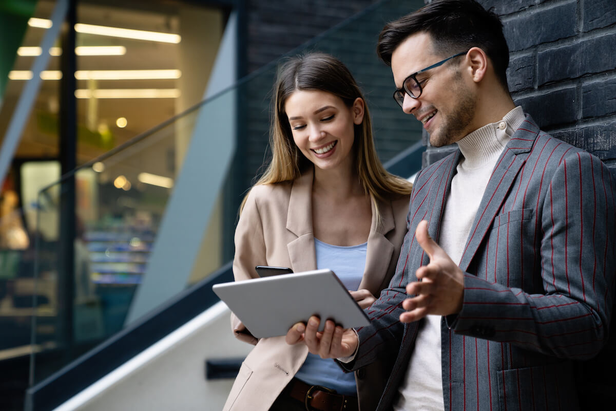 Entrepreneurs watching something on a tablet