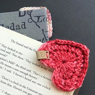 heart shaped corner bookmark on book