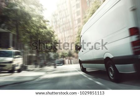 A van moving fast in the city