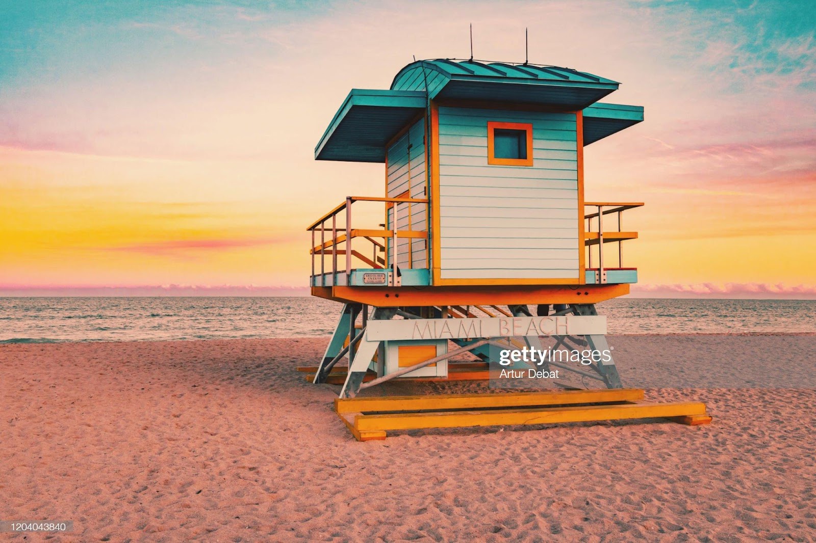 C:\Users\Valerio\Desktop\New folder\colorful-miami-beach-lifeguard-tower-with-stunning-sunset-sky-and-picture-id1204043840.jpg