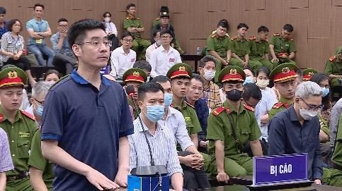 Cựu điều tra viên Hoàng Văn Hưng trong phiên xét xử ngày 14/7. Ảnh: Ngọc Thành