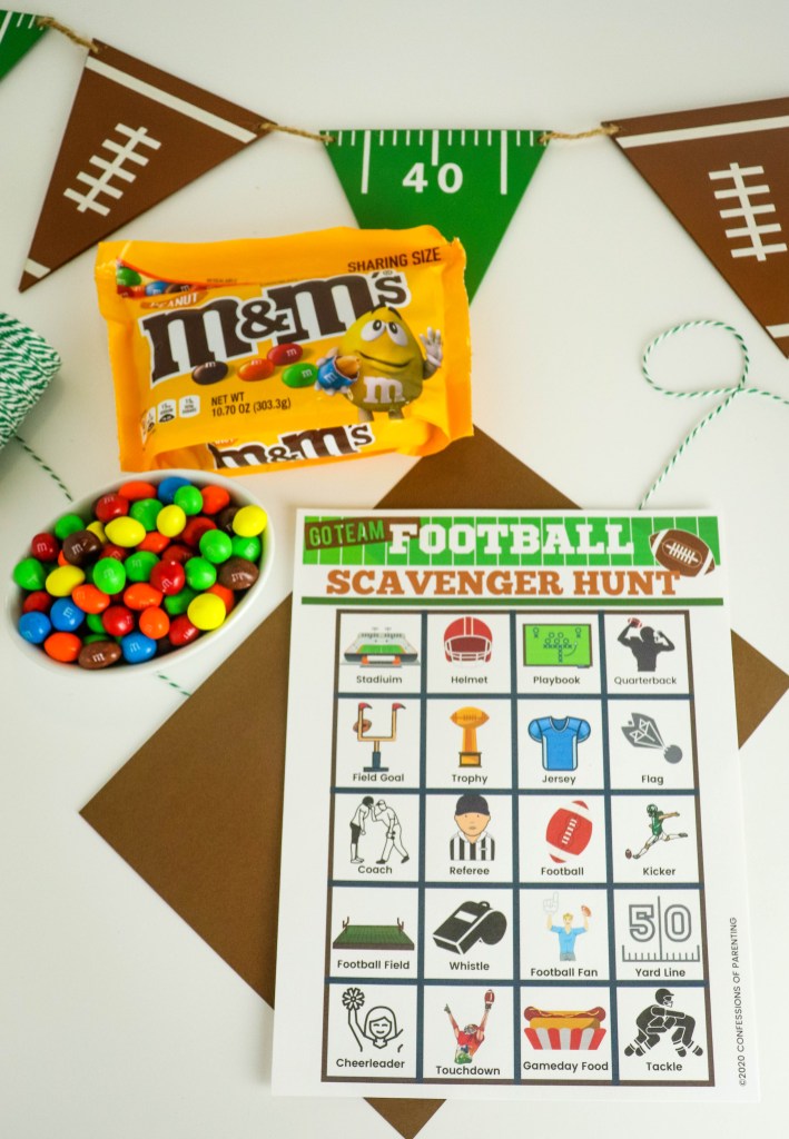 Football Bingo sheet with Peanut M&M's package, a bowl of Peanut M&M's and a football banner