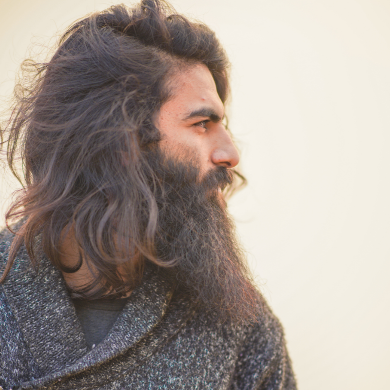 Neglecting the skin beneath your beard can lead to issues like dryness, itching, and acne.