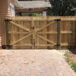 Photo of a wood double gate in Tampa Florida by Elite Fence & Outdoor