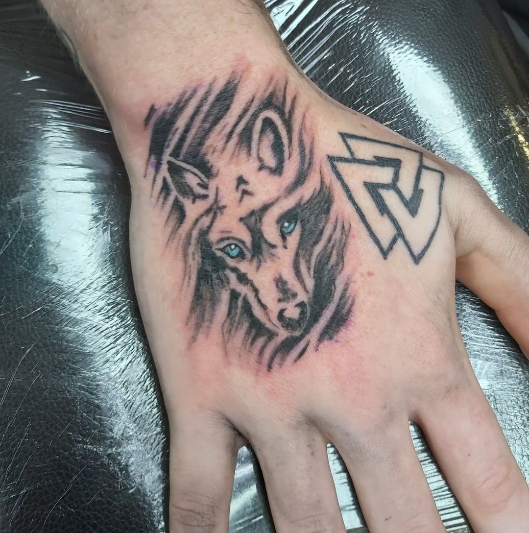 Small Wolf Head Tattoo Design