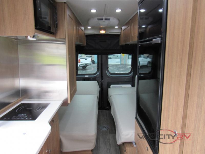The rear seating area transforms into twin beds or a queen bed easily.