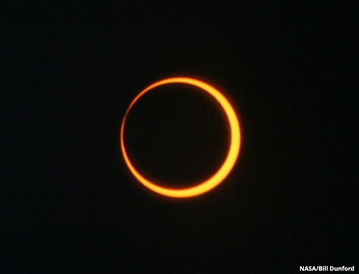 NASA Bill Dunford Annular Eclipse Photo showing an orange glowing ring
