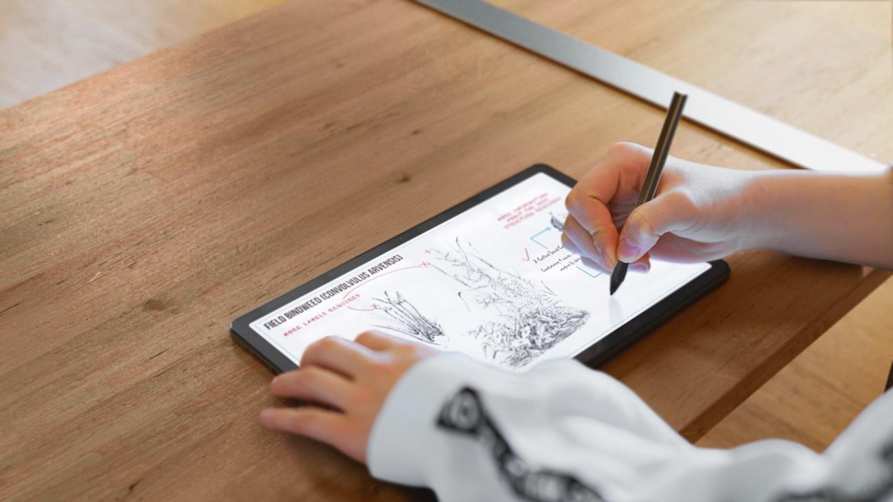 A person drawing on a tablet

Description automatically generated with low confidence