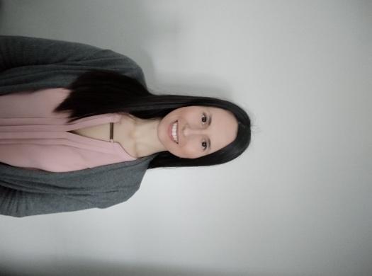 A person smiling for the camera
Description automatically generated with medium confidence