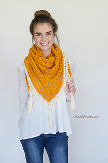 woman wearing triangle scarf with tassels