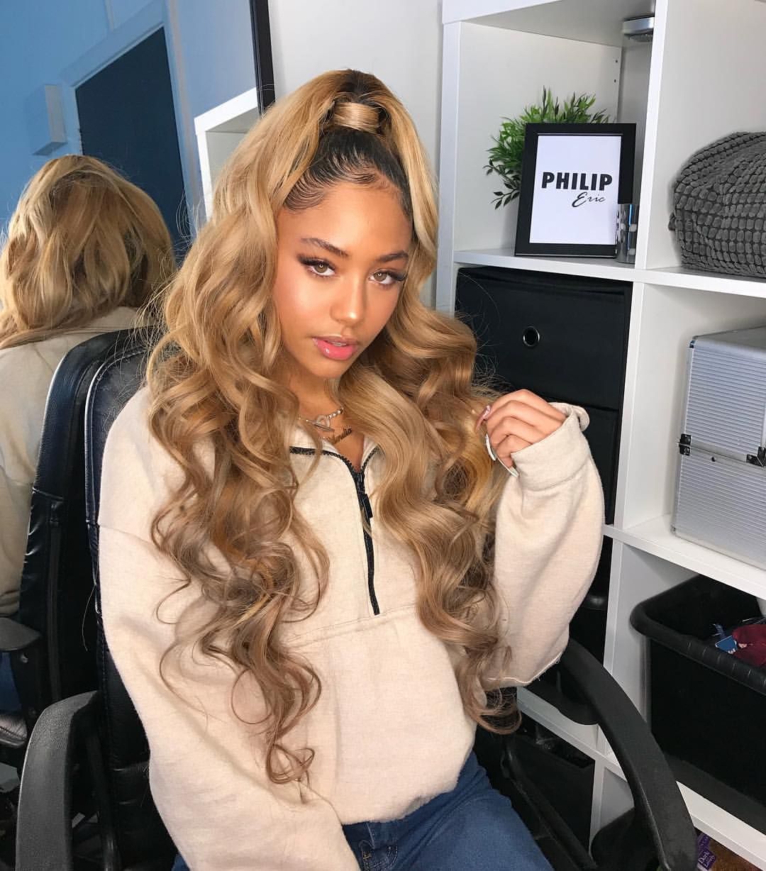 Blonde half-up, half-down hairstyle 