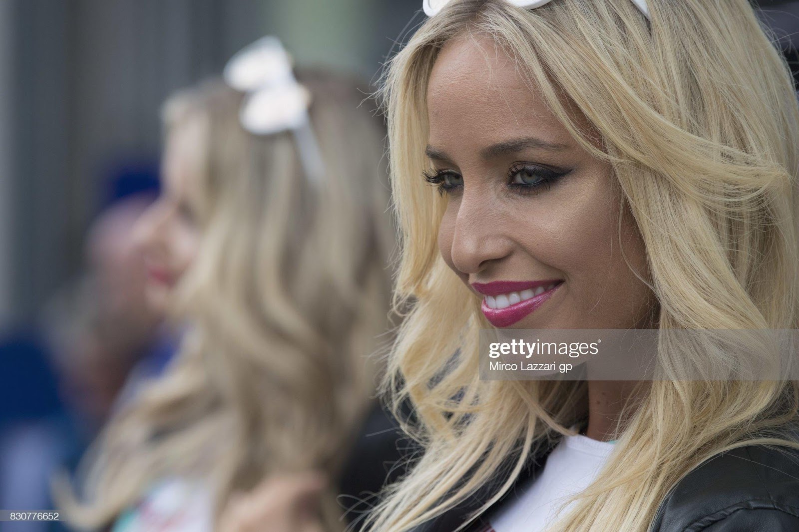 D:\Documenti\posts\posts\Women and motorsport\foto\Getty e altre\grid-girl-smiles-in-paddock-during-the-motogp-of-austria-qualifying-picture-id830776652.jpg