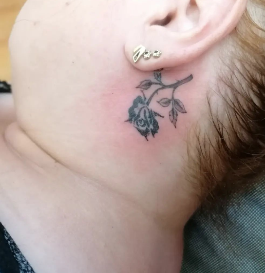 Ear Back Upside Down Rose Tattoo