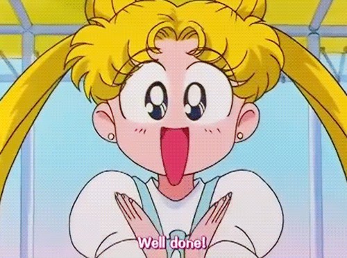 Image is a gif featuring a person with two yellow ponytails clapping her hands and opening her mouth saying "Well done!" 