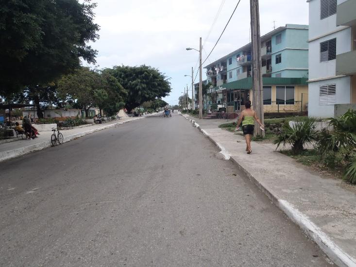 A person running on a street

Description automatically generated with low confidence