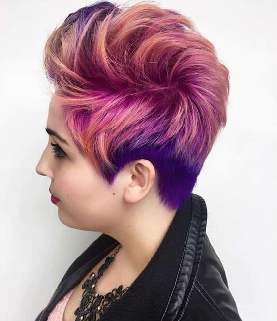 side view of a lady wearing multi-colored pixie cut hairstyle