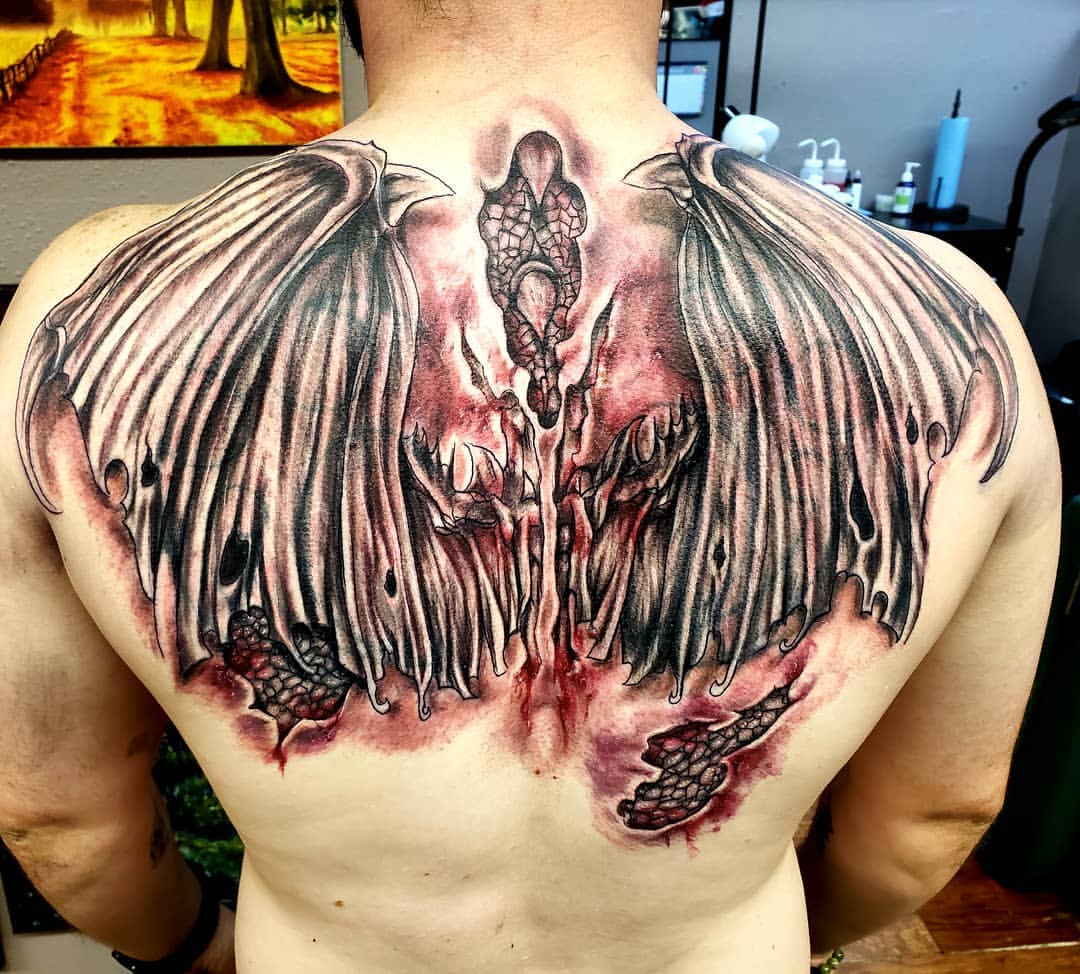 Awesome Dragon Wings Tattoo