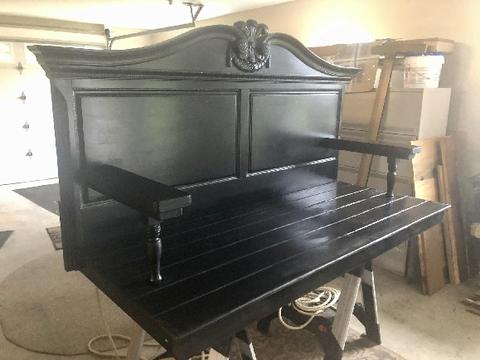 After you turn a sleigh bed into a porch swing, paint it to give it a modern touch