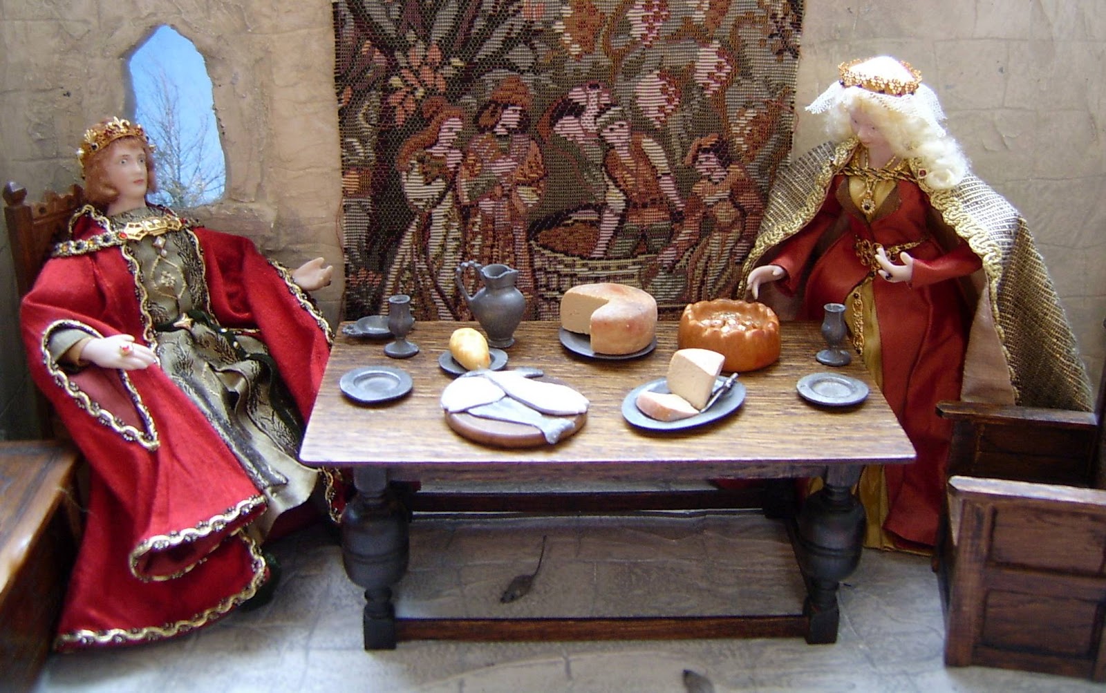 HENRY III & ELEANOR AT TABLE IN SCENE.jpg