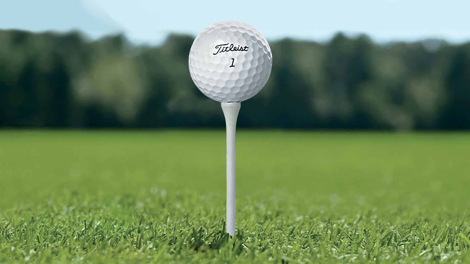 Titleist golf ball sitting on a tee