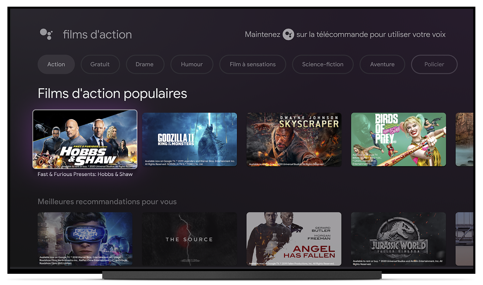 Photograph of a TV screen showing Google TV and content viewing options