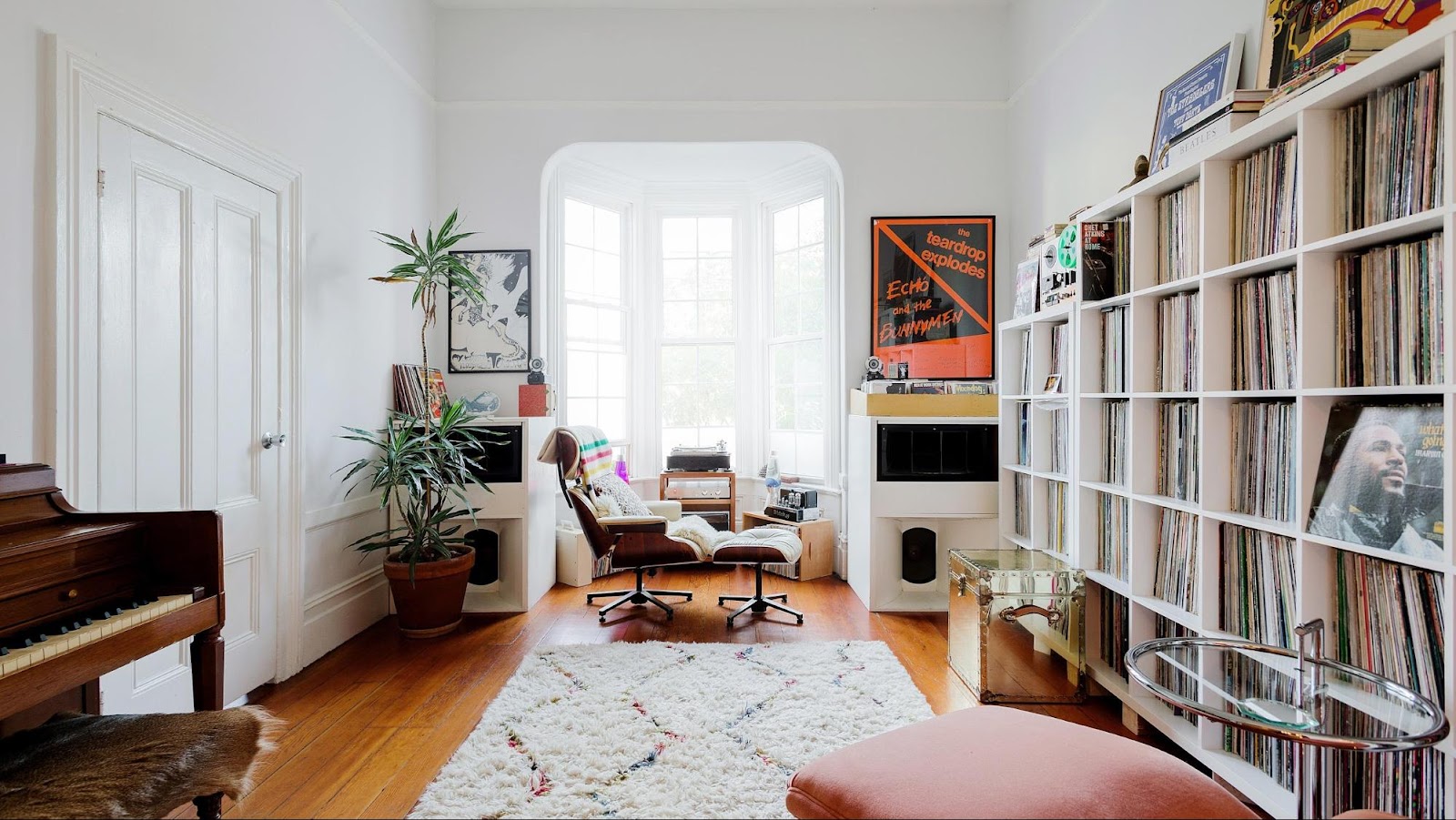 A modern home interior with a vast record collection