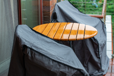 furniture covers in the middle of rain during the autumn in Lansing Michigan