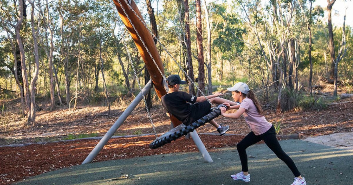  Swing in nature-play playground at Warril Parkland