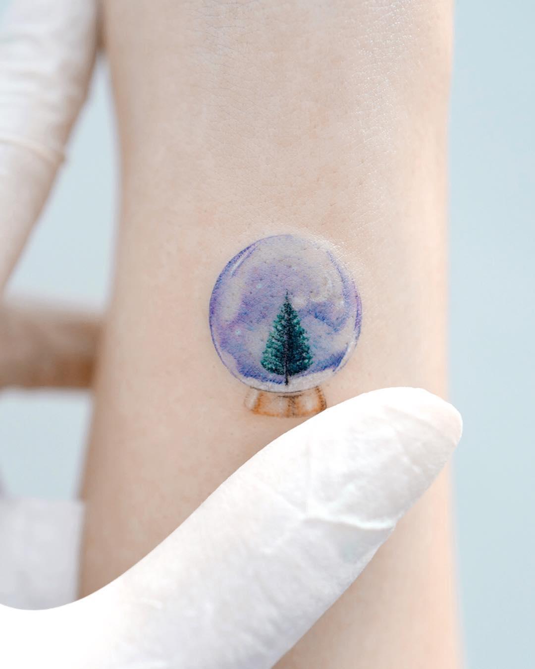 Snowball with a snowy winter by Studio Bysol - Tattoogrid.net