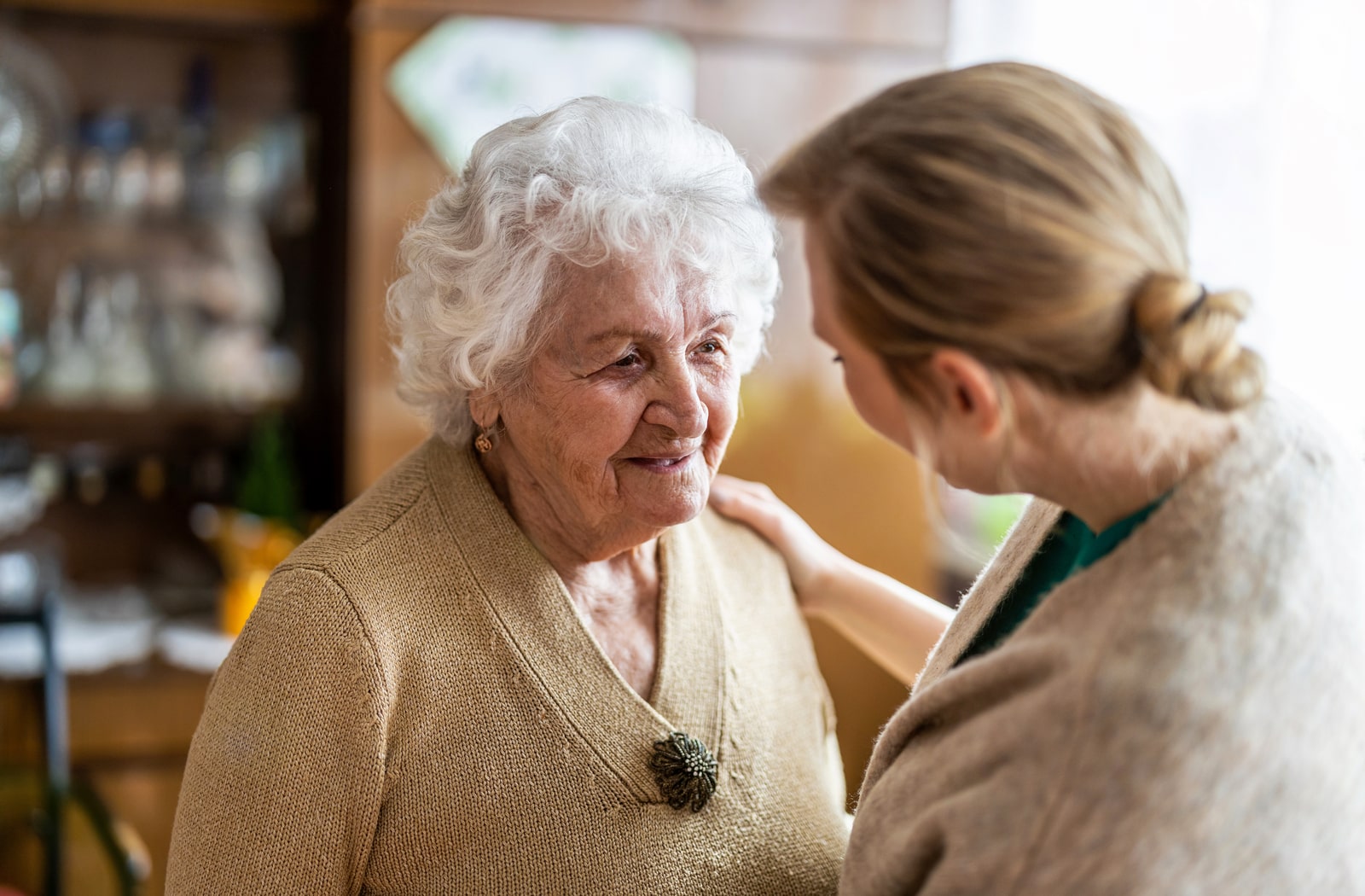 A female nurse interacting with a dementia patient