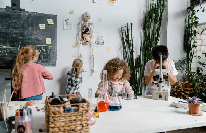 A group of students in a science lab

