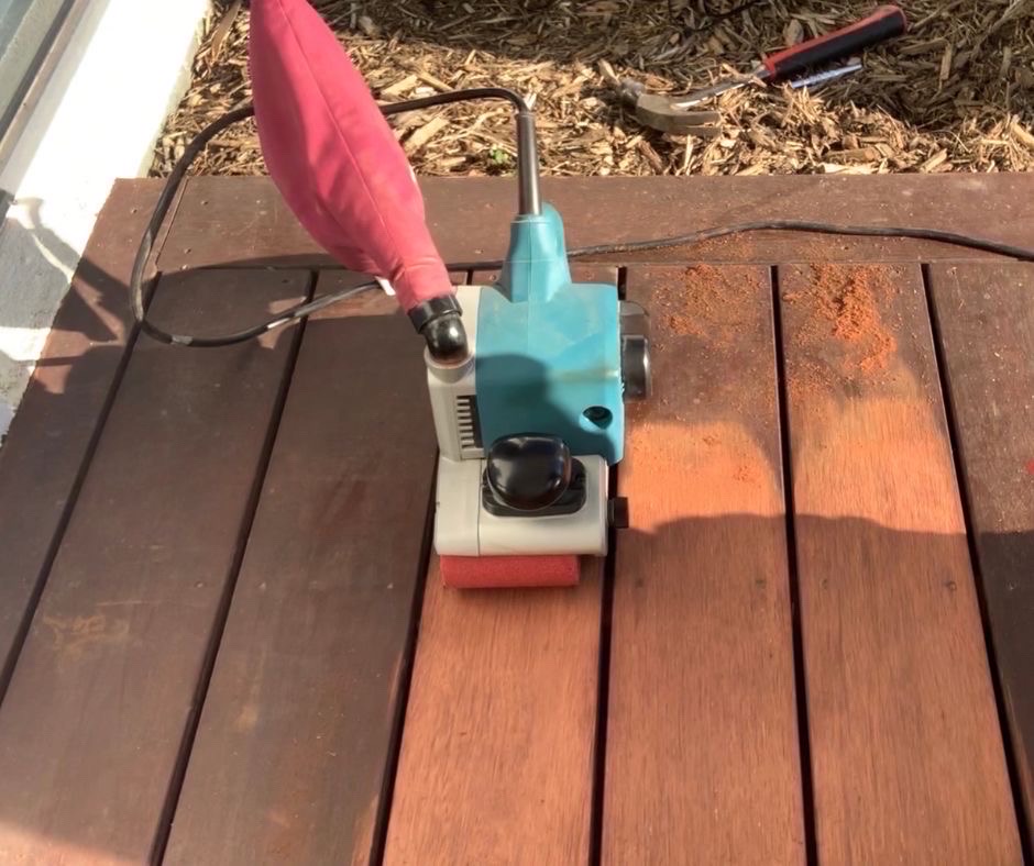 Belt sander to remove peeling deck paint