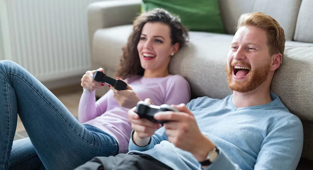 Two people playing video games
Description automatically generated with medium confidence