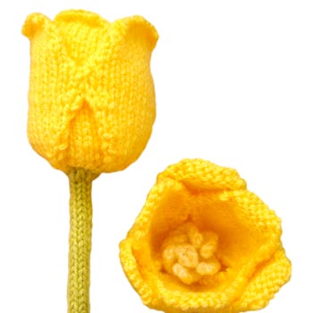 yellow knitted tulips on white background