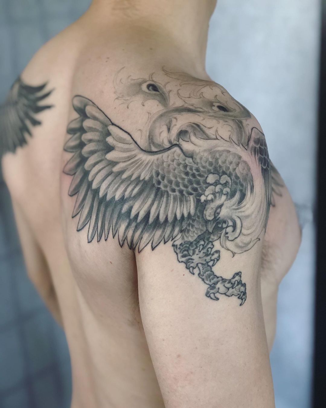 Phoenix Tattoo With Scary Eyes