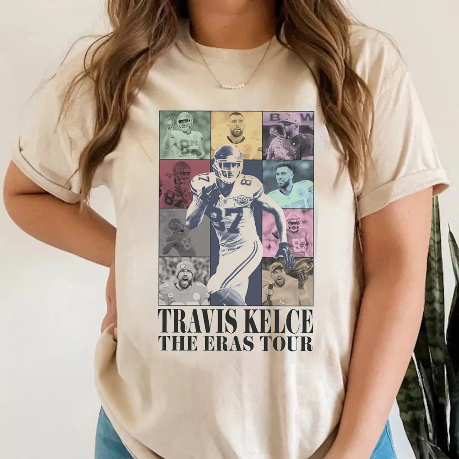 A woman in a Travis Kelce: The Eras Tour t-shirt