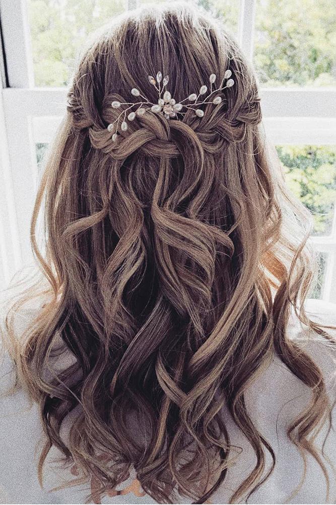loose wedding hair with elegant hair piece