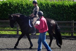 jason instructing rider