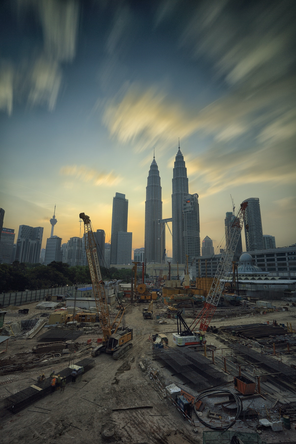A construction site with tall buildings

Description automatically generated