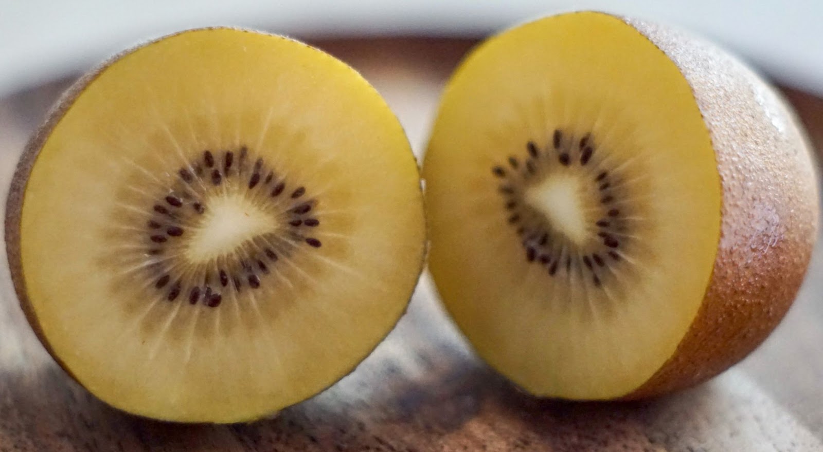 Sliced yellow Kiwi fruit.