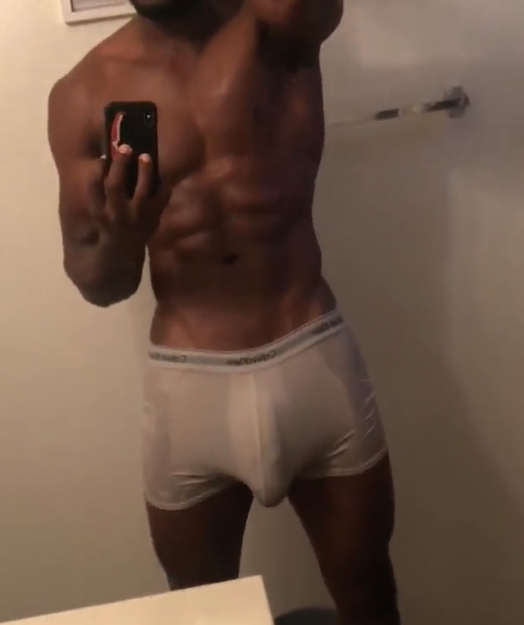 blurry mirror selfie of Marshall price with his hard cock peeking through white and wet Calvin Klein boxer briefs
