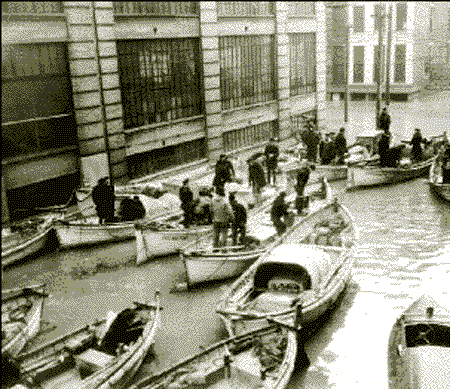 Street traffic during 1937 flood