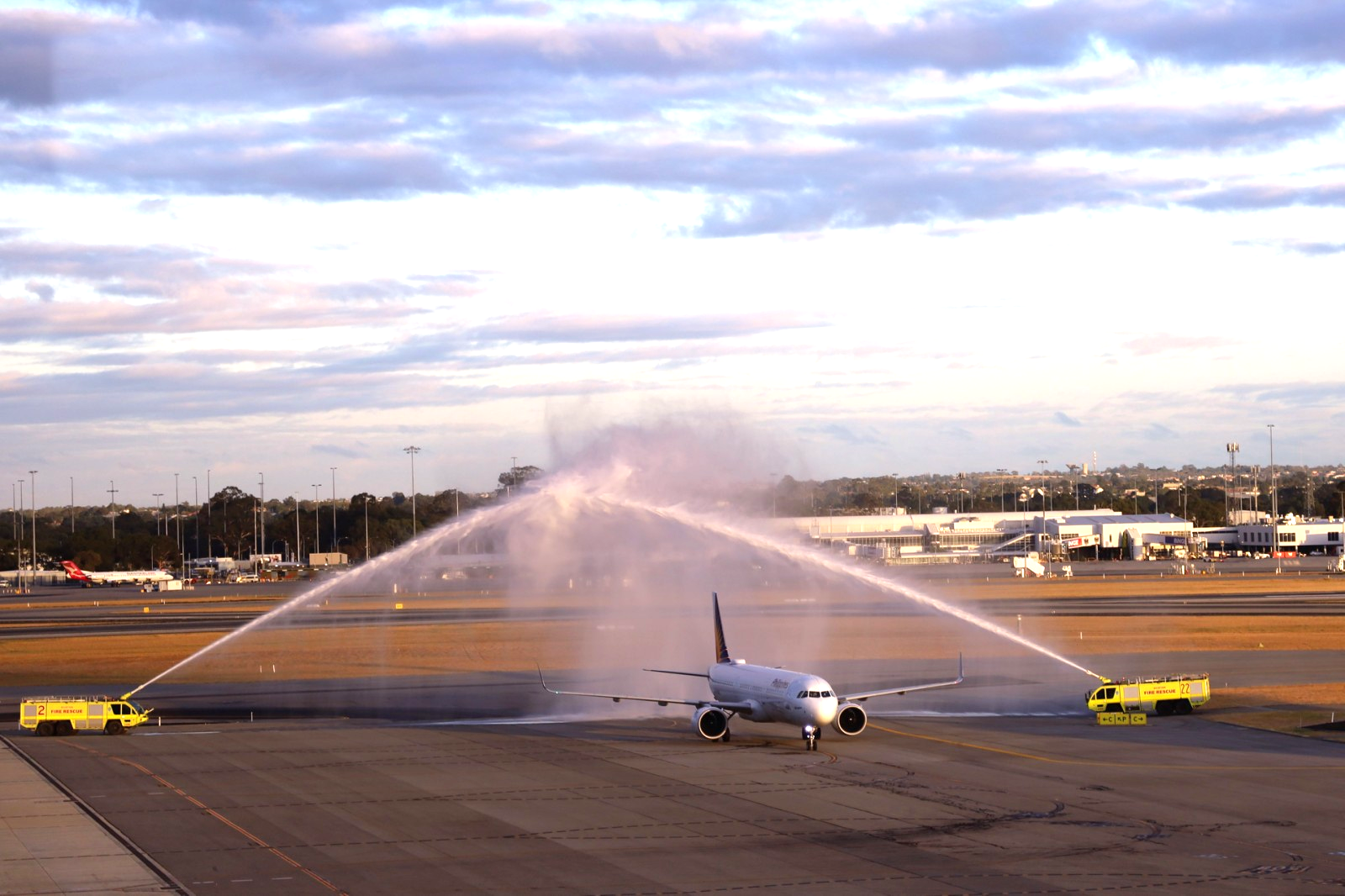 A picture containing outdoor, plane, sky, roadDescription automatically generated