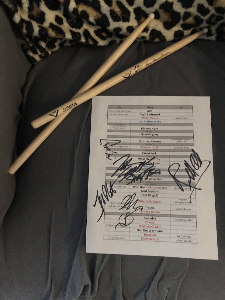 Signature drum sticks and signed set list