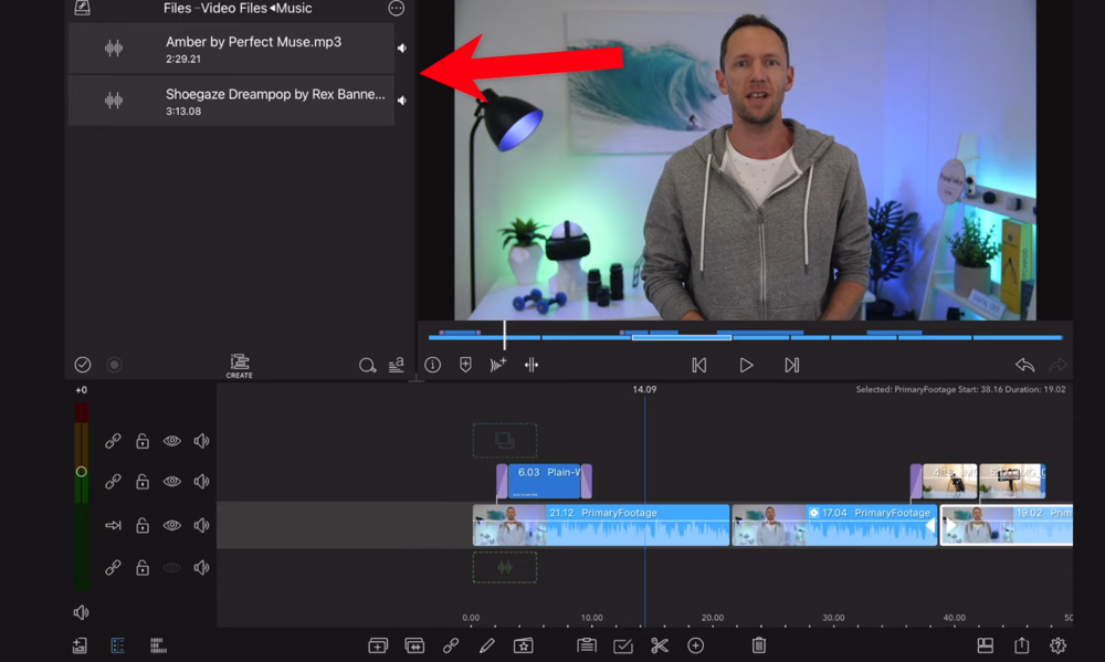 Drag the audio track from the Import area onto the timeline below your primary footage