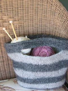 striped felted knit bag in wicker chair