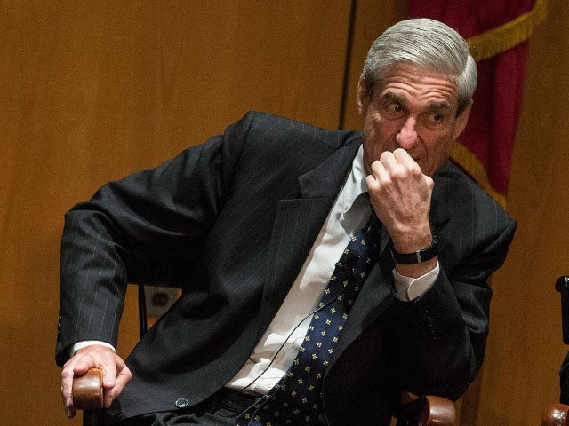 NEW YORK, NY - AUGUST 08: Robert S. Mueller III, Director of the Federal Bureau of Investigation (FBI), takes part in a question-and-answer forum at the International Conference on Cyber Security (ICCS) on August 8, 2013 in New York City. The ICCS, which is co-hosted by Fordham University and the FBI, is held every 18 months; more than 25 countries are represented at this year's conference. (Photo by Andrew Burton/Getty Images)