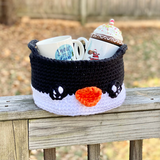 penguin gift basket with mugs inside