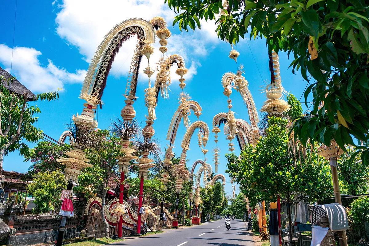 Bali-itinerary-Streets-in-Bali-with-traditional-Balinese-penjors.png