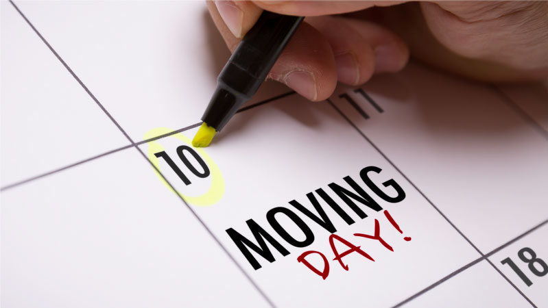 A person is planning ahead for their Sarasota move, circling the 10th day of the month for moving day.